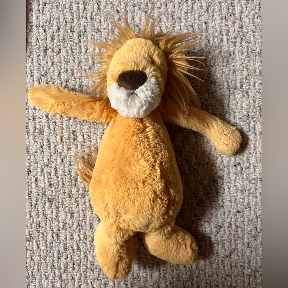 Jellycat Bashful Lion stuffed animal. Golden yellow plush fur caramel mane
